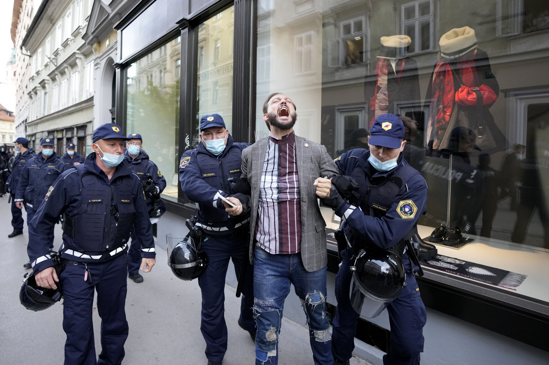 APTOPIX Virus Outbreak Slovenia Protest